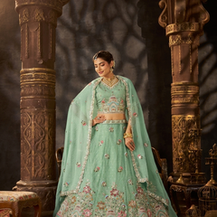 Peach Festive Moss Butti Embroidered Lehenga Choli